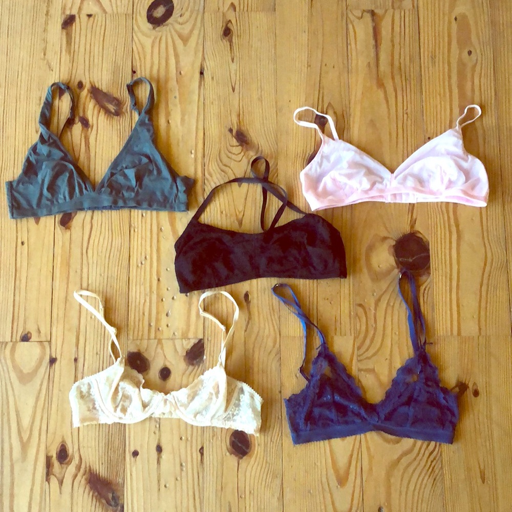 Various lacy bralettes and bras.